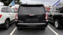 2015 Black /Black GMC Yukon SLT 4WD (1GKS2BKC0FR) with an 5.3L V8 OHV 16V FFV engine, 6-Speed Automatic transmission, located at 945 E. Jefferson Blvd, Dallas, TX, 75203, (214) 943-7777, 32.752514, -96.811630 - Photo#3